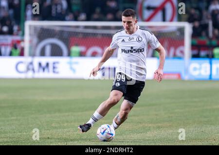 Warschau, Polen. 12. Februar 2023. Bartosz Slisz von Legia in Aktion während des Spiels der polnischen PKO Ekstraklasa League zwischen Legia Warszawa und Cracovia im Marschall Jozef Pilsudski Legia Warsaw Municipal Stadium. Endstand: Legia Warszawa 2:2 Cracovia. Kredit: SOPA Images Limited/Alamy Live News Stockfoto