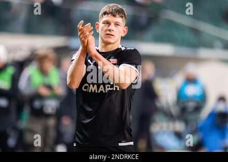 Warschau, Polen. 12. Februar 2023. Kacper Smiglewski von Cracovia applaudiert während des Spiels der polnischen PKO Ekstraklasa League zwischen Legia Warszawa und Cracovia im Marschall Jozef Pilsudski Legia Warsaw Municipal Stadium. Endstand: Legia Warszawa 2:2 Cracovia. (Foto: Mikolaj Barbanell/SOPA Images/Sipa USA) Guthaben: SIPA USA/Alamy Live News Stockfoto