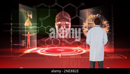 Die Zusammensetzung des männlichen Arztes unter Verwendung des virtuellen Bildschirms mit medizinischen Symbolen Stockfoto