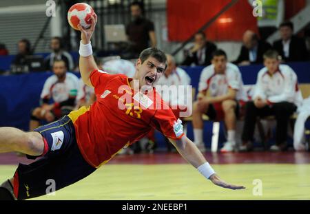 Julen Aguinagalde of Spain scores during the men's handball European Championship second round match against Poland in Innsbruck, Austria, on Sunday, Jan. 24 , 2010. (AP Photo/Kerstin Joensson)