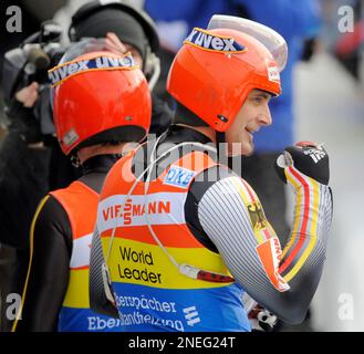 Winner Andre Florschuetz, right, and Torsten Wustlich, left, of Germany
