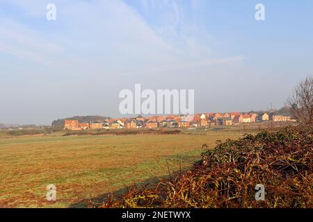 Eine neue Wohnanlage am Stadtrand von Hunstanton, die in die grüne Landschaft einfährt Stockfoto