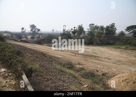 Der asiatische Highway 45 wird in der Nähe des Tata Nano-Kontroversen-Landes in Singur, Hooghly, West Bengal, Indien erweitert. Stockfoto