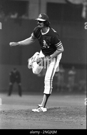 Oakland A's relief pitcher Rollie Fingers fingers his handlebar mustache in  Oakland, California, Saturday, October 15, 1973. Many of his teammates  boast facial foliage, but none compares with Fingers' finely waxed lip
