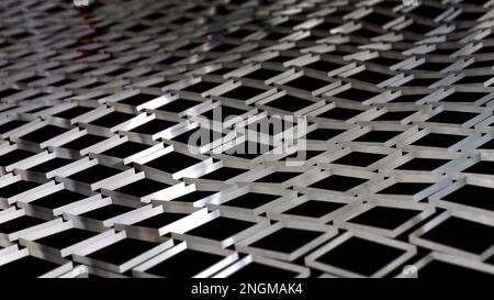 Metallgitter, die in Wellen im Weltraum schweben, abstrakter Hintergrund, endloses geometrisches Feld auf schwarzem Hintergrund. Stockfoto