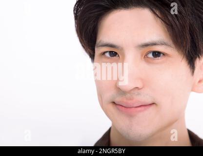 Gut aussehender junger Mann mit gesundem Gesicht Stockfoto