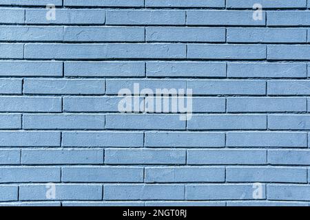 Hintergrund einer bemalten blauen Steinwand Stockfoto