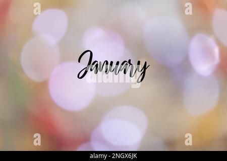 Ein verschwommener, farbenfroher Hintergrund mit dem Namen „Januar“ auf Englisch. Stockfoto