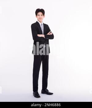 Das Porträt eines jungen Geschäftsmannes im Stehen Stockfoto