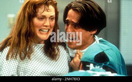 NEUNMONATIGER 1995 20. Century Fox Film mit Julianne Moore und Hugh Grant Stockfoto