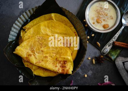 Hausgemachter Kerala Trivandrum Boli serviert mit palada Pradaman Stockfoto