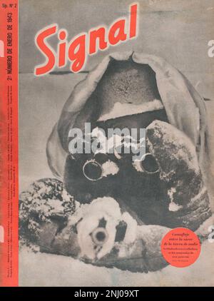 Die Geschichte Deutschlands. „Signal“-Magazin. Titelseite der Ausgabe Nr. 2 (Januar 1943) der spanischen Ausgabe (SP 2), in der ein deutscher Soldat getarnt ist. Tarnung im Schnee im Niemandsland, Maschinengewehrsoldaten auf den Außenposten einer Position. Dieses Magazin wurde zwischen April 1940 und April 1945 veröffentlicht und war während des Zweiten Weltkriegs das wichtigste Propagandaorgan der deutschen Armee Stockfoto