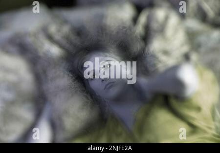 Frau leidet an Schlaflosigkeit Stockfoto