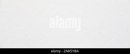Nahaufnahme der Struktur von grobem weißem Recyclingpapier Stockfoto