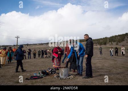 Canadian Prime Minister Justin Trudeau places tobacco in a ceremonial fire along with Williams Lake First Nation Chief Willie Sellars, right, Assembly of First Nations National Chief RoseAnne Archibald, left, and Minister of Crown Indigenous Relations Marc Miller, back, on the former grounds of St. Joseph's Mission Residential School, in Williams Lake, British Columbia, Wednesday, March 30, 2022. In January, the Williams Lake First Nation announced it had identified 93 'reflections' that could indicate the number of children buried around the site of the former residential school. (Darryl Dyck