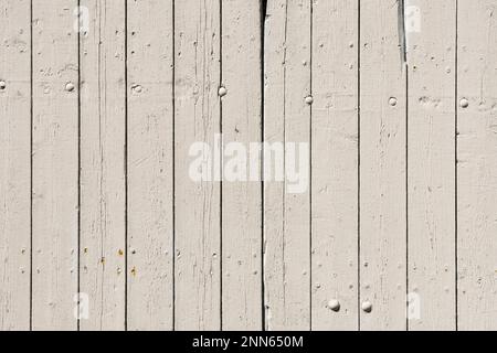 Rustikale Holzplanken mit viel Textur in hellen Farbtönen. Stockfoto