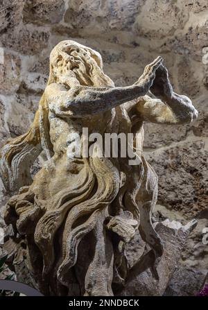 Steinskulptur von St. Onuphrius, Rukomysh. Geschrieben von Pinzel. Stockfoto