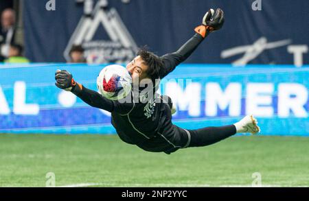 Vancouver Whitecaps FC's goalkeeper Yohei Takaoka dives to make a save