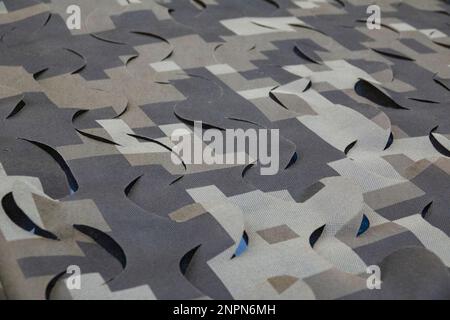 Militärische Tarnung. Oliven-Camo-Netz Stockfoto