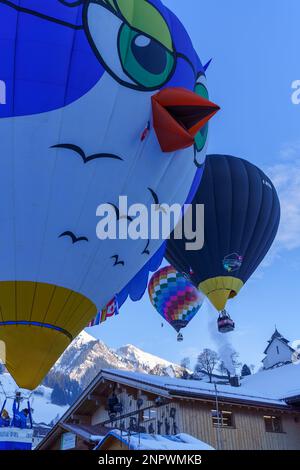 A row of balloons. Taken at 42nd International Balloon Festival in Chateau D'Oex in January 2023. Stock Photo