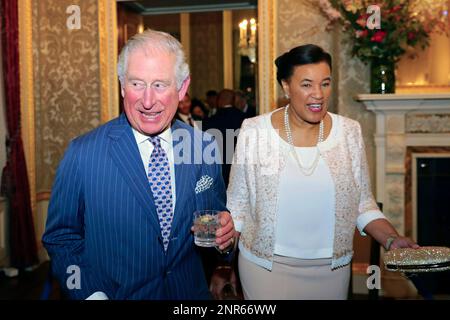 Britain's Prince Charles and Commonwealth Secretary-General, Rt Hon Patricia Scotland, attend the annual Commonwealth day reception at Marlborough House, the home of the Commonwealth Secretariat, in London, Monday, March 9, 2020. (Aaron Chown/Pool Photo via AP)