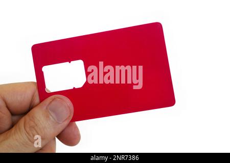 Nahaufnahme der Finger eines Mannes mit einem leeren roten Smart Card-Halter. Stockfoto