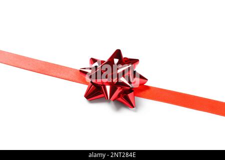 Band mit roter Schleife auf weißem Hintergrund Stockfoto