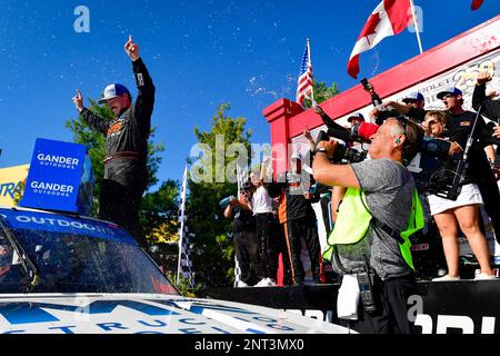 #24: Brett Moffitt, GMS Racing, Chevrolet Silverado celebrates after winning the NASCAR Gander Outdoors Truck Series Chevrolet Silverado 250 at Canadian Tire Motorsport Park, Sunday, August 25, 2019, in Bowmanville, Ont. (AP Photo/NKP, Logan Whitton) MANDATORY CREDIT