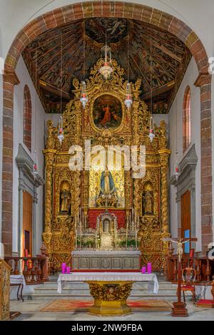 The Baroque Churrigueresque style high altar in Iglesia Nuestra Señora de La Concepción in Santa Cruz Stock Photo