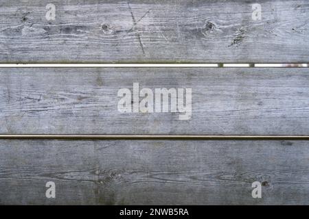 Drei horizontale Holzbretter mit Kratzspuren, Nahaufnahme. Hintergrundtextur. Stockfoto
