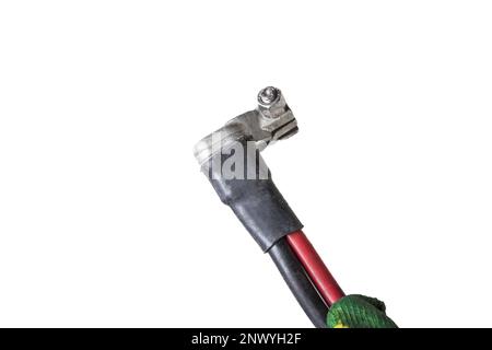 Kfz-Kabelstrang mit Pluspol der Batterie und Zünder zum Trennen im Falle eines Unfalls. Rotes und schwarzes Fahrzeug-Kabel. Stockfoto