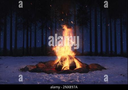 3D großes Lagerfeuer mit Funken und Partikeln rund um schneebedeckte Felder und Kiefern Stockfoto