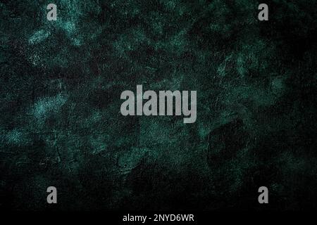 Grüner Grunge-Hintergrund mit Platz für Text. Tiefe smaragdgrüne Textur oder Hintergrund mit Flecken, Wellen und Faserelementen. Bild mit Position für Tex Stockfoto