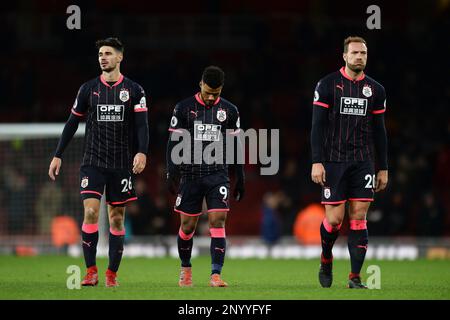 Die Spieler von Huddersfield Town Christopher Schindler (links), Elias Kachunga (Mitte) und Laurent Depoitre sehen beim letzten Trick deprimiert aus – Arsenal gegen Huddersfield Town, Premier League, Emirates Stadium, London – 29. November 2017. Stockfoto