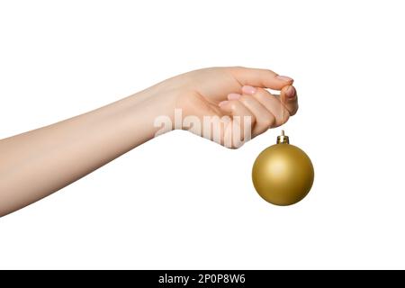 Goldene Kugel, weihnachtsball in Frauenhand Stockfoto