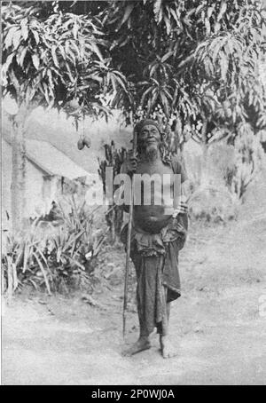 "UN sorcier au Congo francais (Il porte en main l'insigne de ses fonctions: Une queue d'Elephant); L'Ouest Africain", 1914. Von „Grande Geographie Bong Illustree“, 1914. Stockfoto