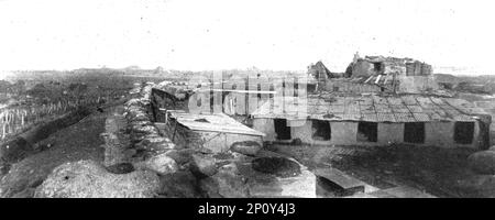 "La guerre modern en Cameroun Nord ; un des Forts allemands de Garoua, tel que le trouverent les troupes franco-Britain apres la capitulation des Allemands avec ses resaux de fils barbeles, ses fosses, ses murailles en sacs a terre, ses abris de tole ondulee usw.", 1916. Aus der „Collection de la Guerre IV L'Illustration Tome CXLVII. La Guerre Juillet, Aout, Septembre, Octobre, Novembre, Dez. 1916". Stockfoto