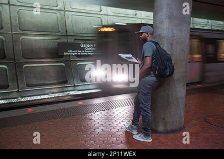 UNITED STATES - AUGUST 24: A man waits for a metro train at the Gallery Place-Chinatown stop, August 24, 2016. (Photo By Tom Williams/CQ Roll Call) (CQ Roll Call via AP Images)
