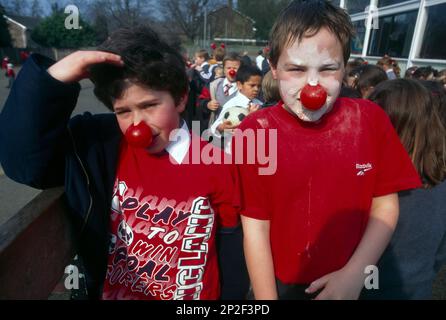 Red Nose Day In Der Schule, Um Geld Für Comic Relief Zu Sammeln Stockfoto