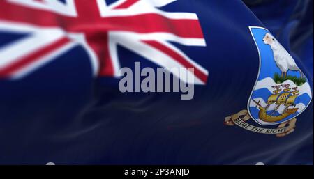 Detail der Falklandinseln Nationalflagge flattern. Flagge mit blauem Hintergrund, Union Jack und Falklands Wappen. Rendern der 3D-Darstellung. Sele Stockfoto