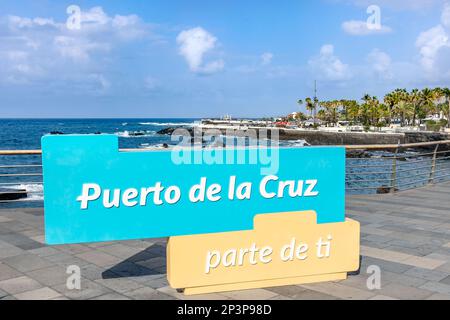 Schild am Ufer in Puerto de la Cruz, Kanarische Inseln. Inschrift: Puerto de la Cruz - ein Teil von Ihnen Stockfoto