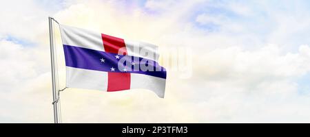 Die Flagge der Niederländischen Antillen winkt auf dem Hintergrund des Himmels. 3D-Rendering Stockfoto