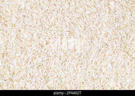 Basmati langer weißer Reishintergrund, Vollformat Stockfoto