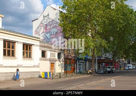 Brüssel, Belgien - Juli 02 2019: Die Katzenmauer befindet sich am Boulevard du Midi. Die Wand zeigt, wie Cat eine Wand baut. Basierend auf der Comic-Serie Stockfoto