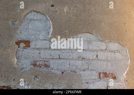 Alte Betonpflastersteine Wandtextur urbaner Hintergrund. Stockfoto