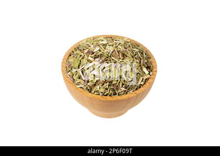 Katzenminkraut auf latein - Nepeta cataria in Holzschüssel isoliert auf weißem Hintergrund. In Holzschüssel isoliert auf weißem Hintergrund. Heilkraut. Stockfoto