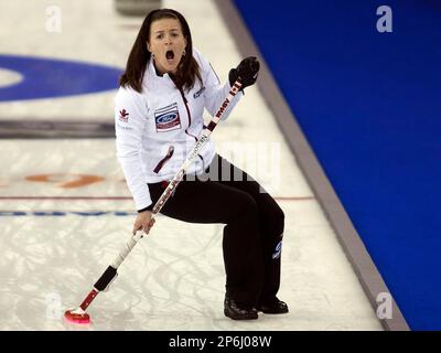 Canada's skip Heather Nedohin directs Laine Peters, left, and Beth