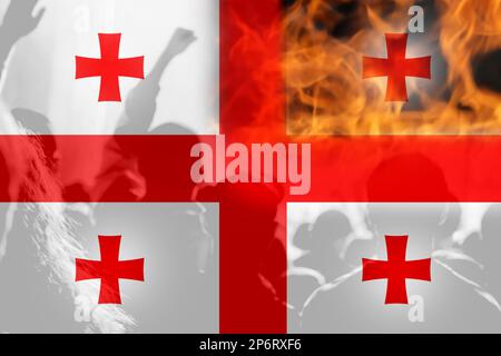 Unschärfe-Protest in Georgien. Konfliktkrieg über die Grenze. Feuer, Flamme. Georgische Flagge. Frauen mit niedrigen Rechten. Männerhände. Autoritäres Recht. Ausländische Agenten. Feuer Stockfoto