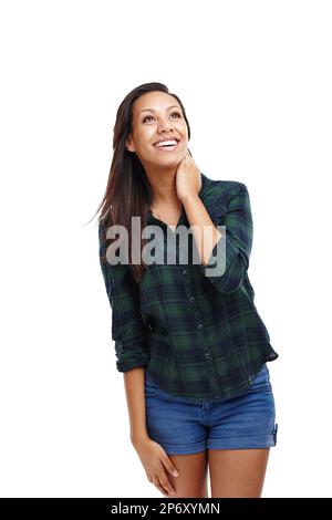 Ich kann es immer noch nicht glauben. Eine attraktive junge Frau, die in einem Studio auf Weiß steht. Stockfoto