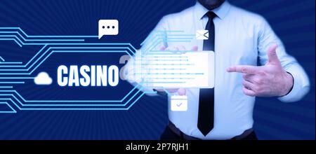 Handgeschriebener Text Casino. Konzept bedeutet ein Gebäude, in dem Spiele, insbesondere Roulette- und Kartenspiele, gespielt werden Stockfoto